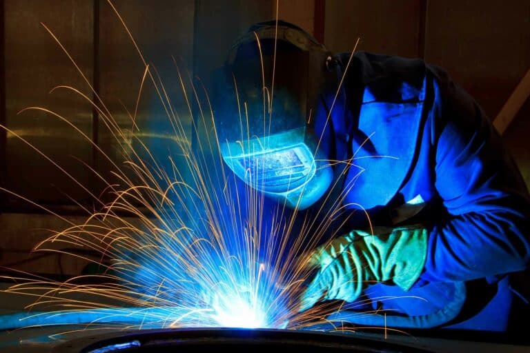 A welder at work. Southern Oregon Businesses are eligible for incentives to keepm the power on during a blackout.